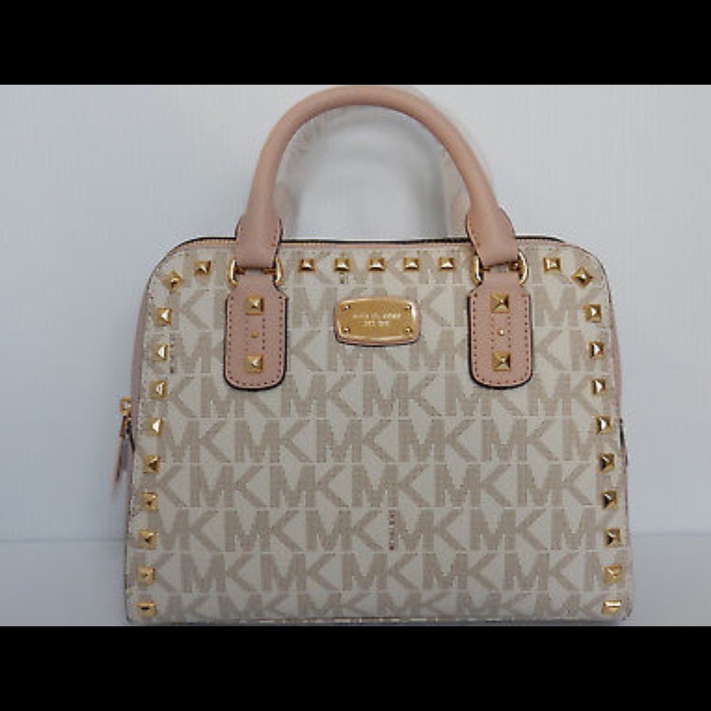 Pink and white studded MIcheal Kors